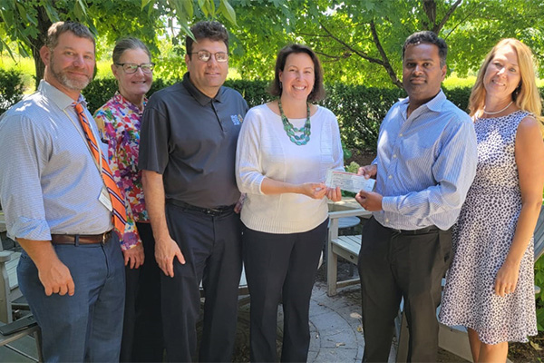 Mahesh Parusha presenting a contribution with community members